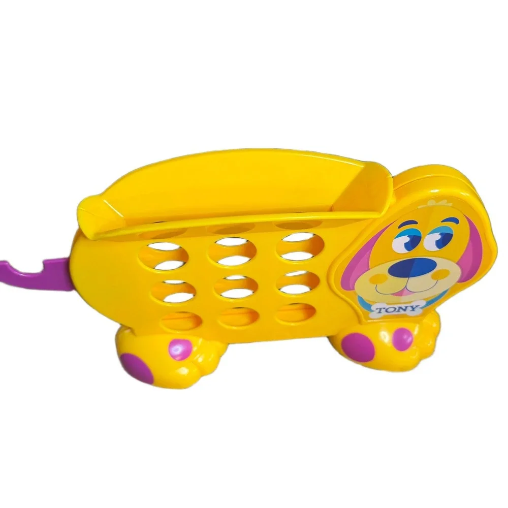Fisher-Price Tony the Dog Coin Bank Yellow Puppy Toy with 11 Red Blue Coins